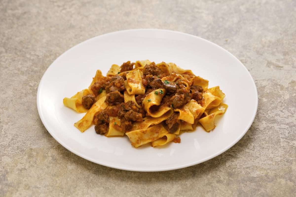 Pappardelle al cinghiale, savoring Florence pasta.