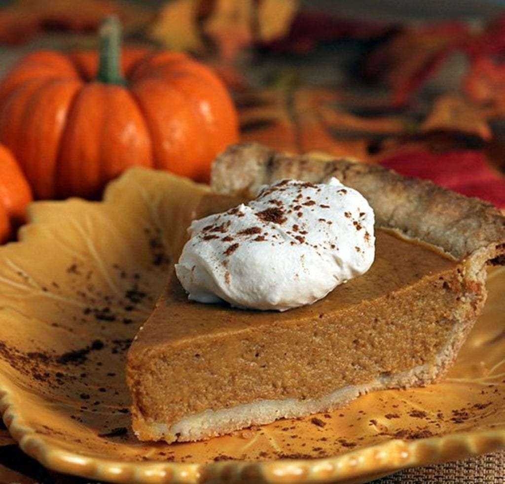 A slice of pumpkin pie, one of classics Halloween desserts.