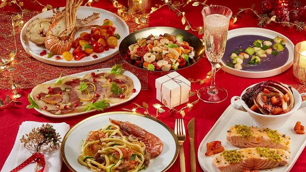 A table set for Christmas eve feast with typical dishes from all over Italy.